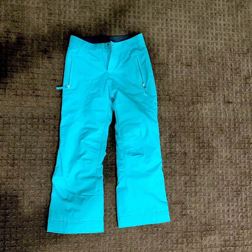 Blue Obermeyer kids ski pants.